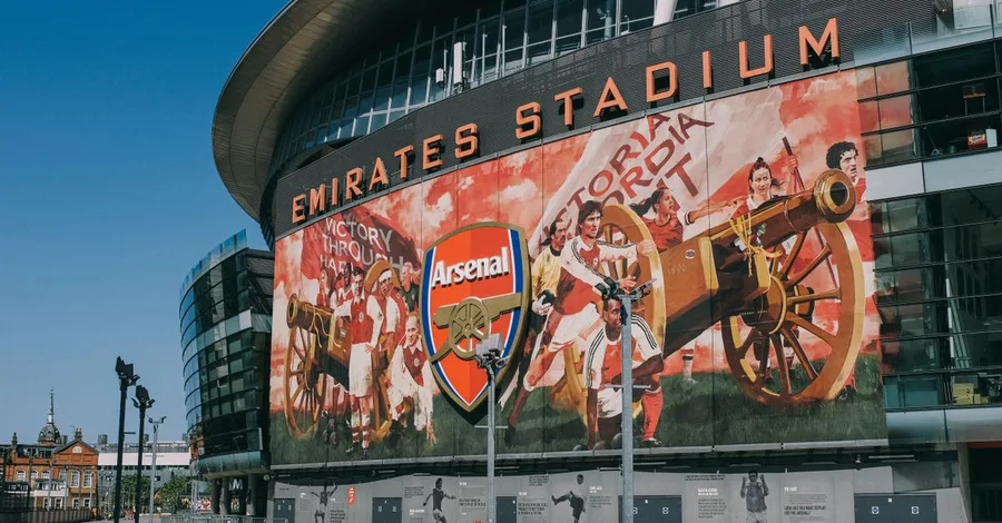 Exterior view of the iconic Emirates Stadium, home of Arsenal FC in London, England.